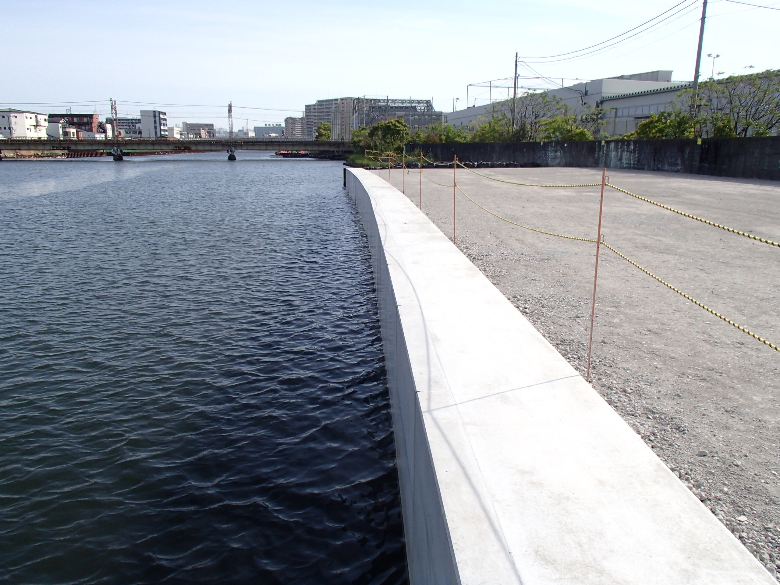 一級河川六軒家川防潮堤補強工事(春日出橋上流左岸)